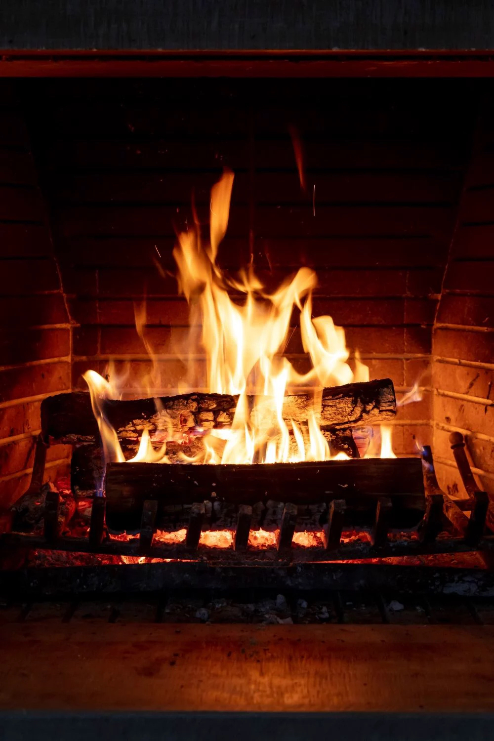Modern log burner with roaring fire